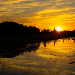 SUNSET BY THE WATER